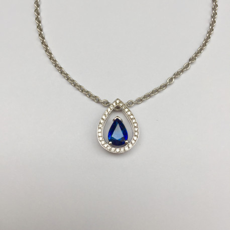 Pendentif poire serti de brillants et d un saphir bleu. Pendentif poire serti de brillants et d un saphir bleu.
