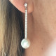 Boucles d oreilles  perles et diamants .